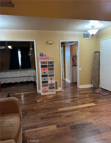 a view of livingroom with furniture and window