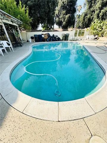 a view of outdoor space and swimming pool