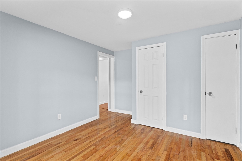 260 Great Road Stow, MA 01775 - Photo 15 of 32 a view of an empty room and wooden floor