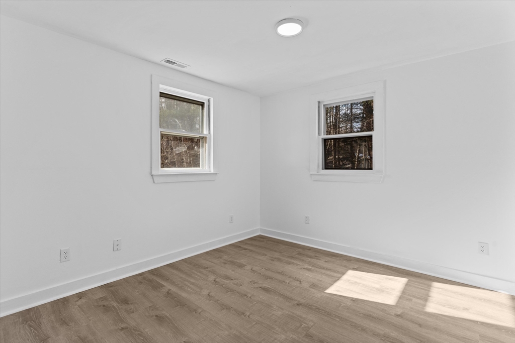 260 Great Road Stow, MA 01775 - Photo 29 of 32 an empty room with a window