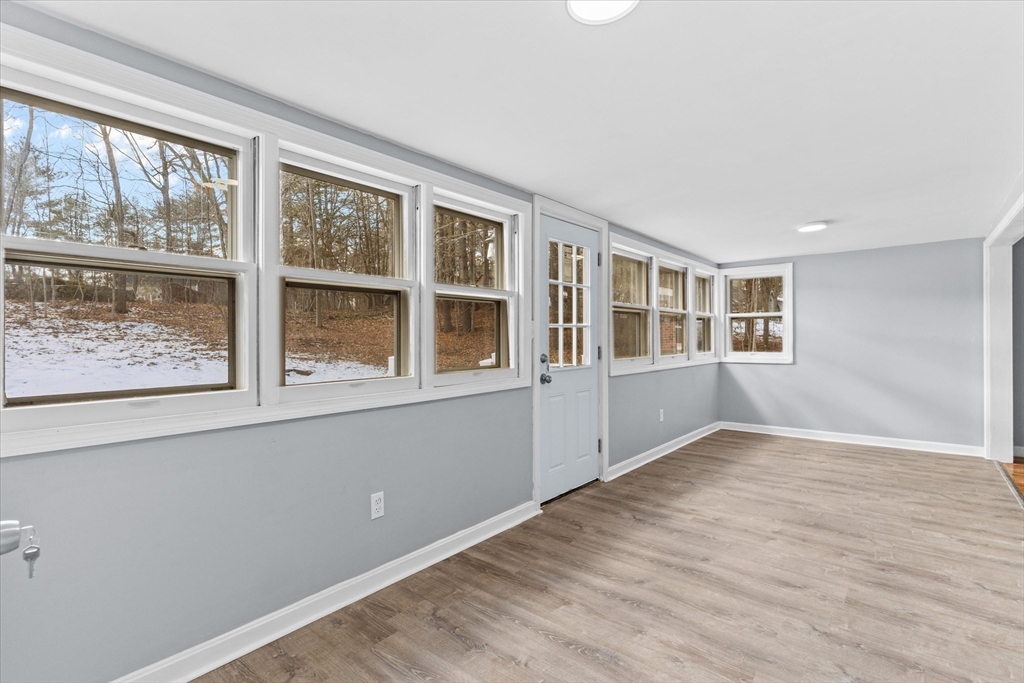 260 Great Road Stow, MA 01775 - Photo 9 of 32 a view of an empty room with a window