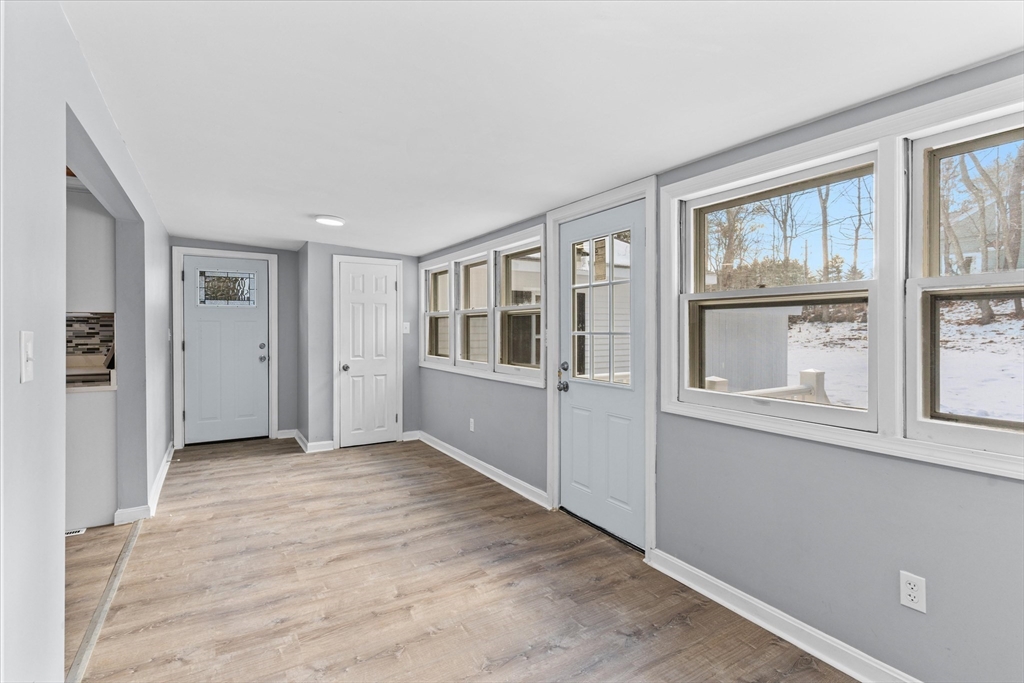 260 Great Road Stow, MA 01775 - Photo 10 of 32 an empty room with windows and closet
