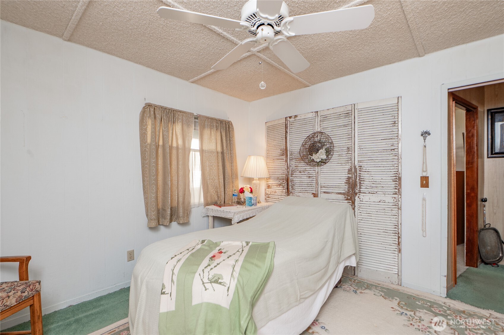 8370 Harborview Road, Unit 15 Blaine, WA 98230 - Photo 11 of 26 a bedroom with bed and a window