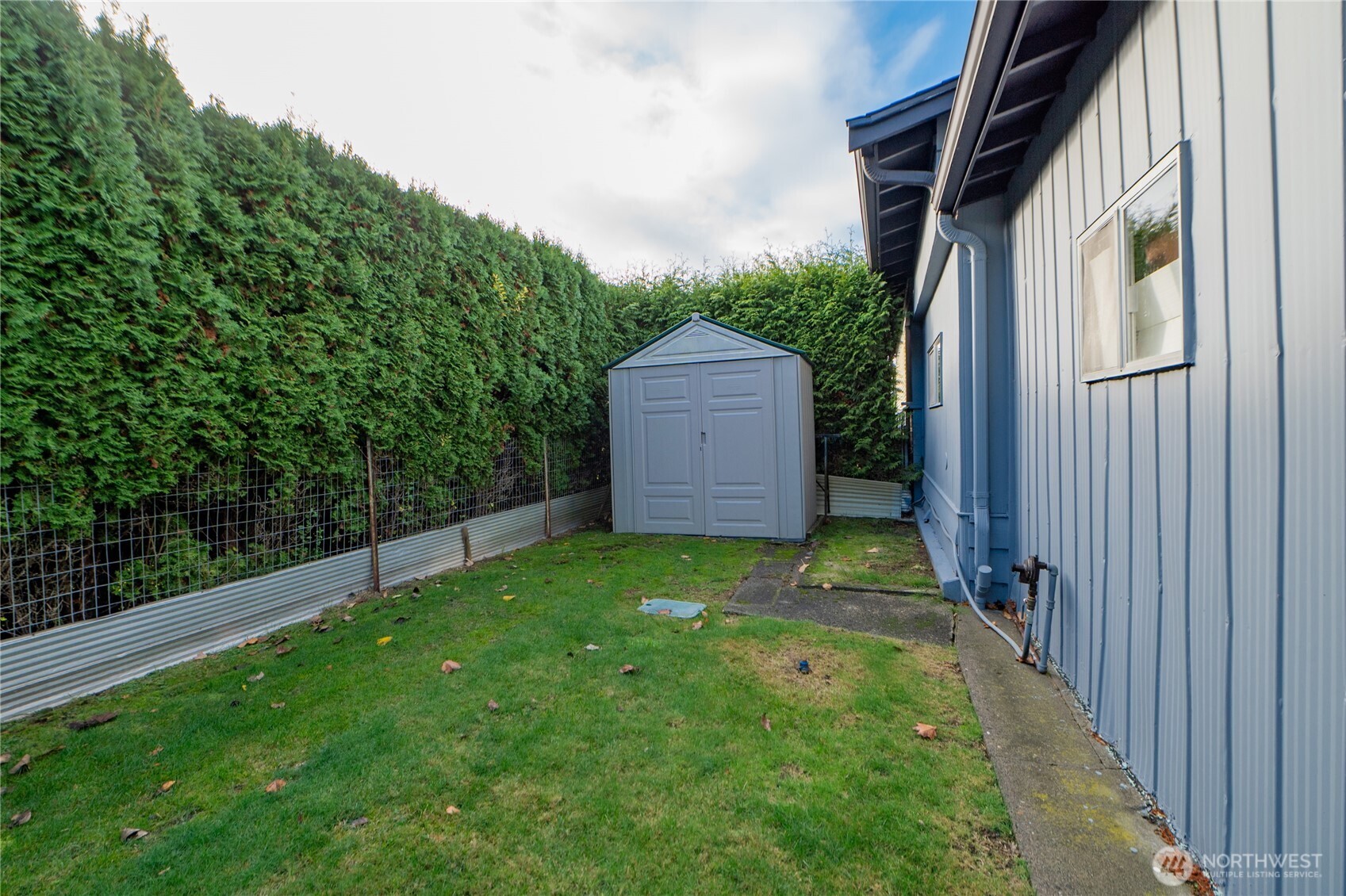 8370 Harborview Road, Unit 15 Blaine, WA 98230 - Photo 16 of 26 a view of a back yard