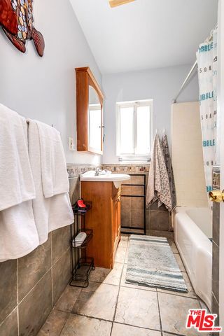 a living room with a couch and a table