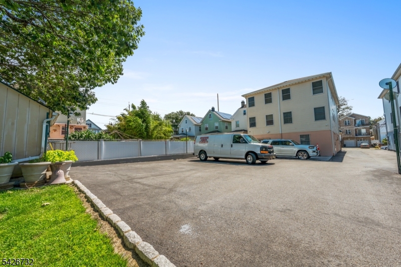 939 Grove Street Elizabeth, NJ 07202 - Photo 17 of 18 a view of street with parked cars