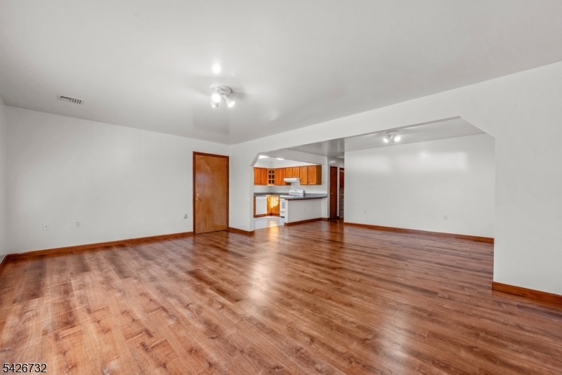 939 Grove Street Elizabeth, NJ 07202 - Photo 4 of 18 a view of empty room with wooden floor