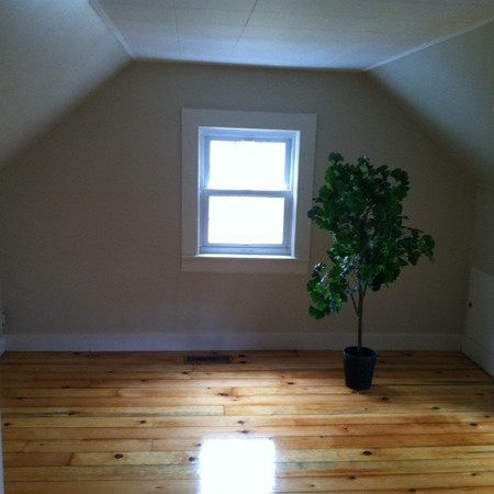 9 Johnson Road Sterling, MA 01564 - Photo 17 of 24 a view of a room with wooden floor and plant