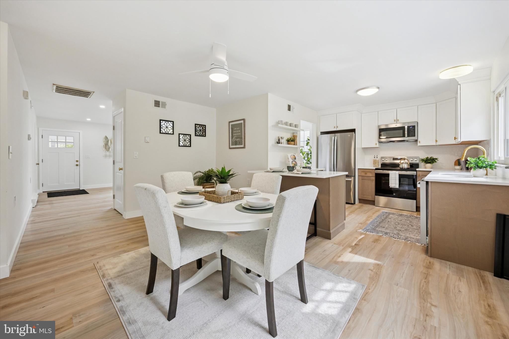 114 Gramercy Place Southampton, NJ 08088 - Photo 15 of 23 a view of a dining room with furniture and wooden floor