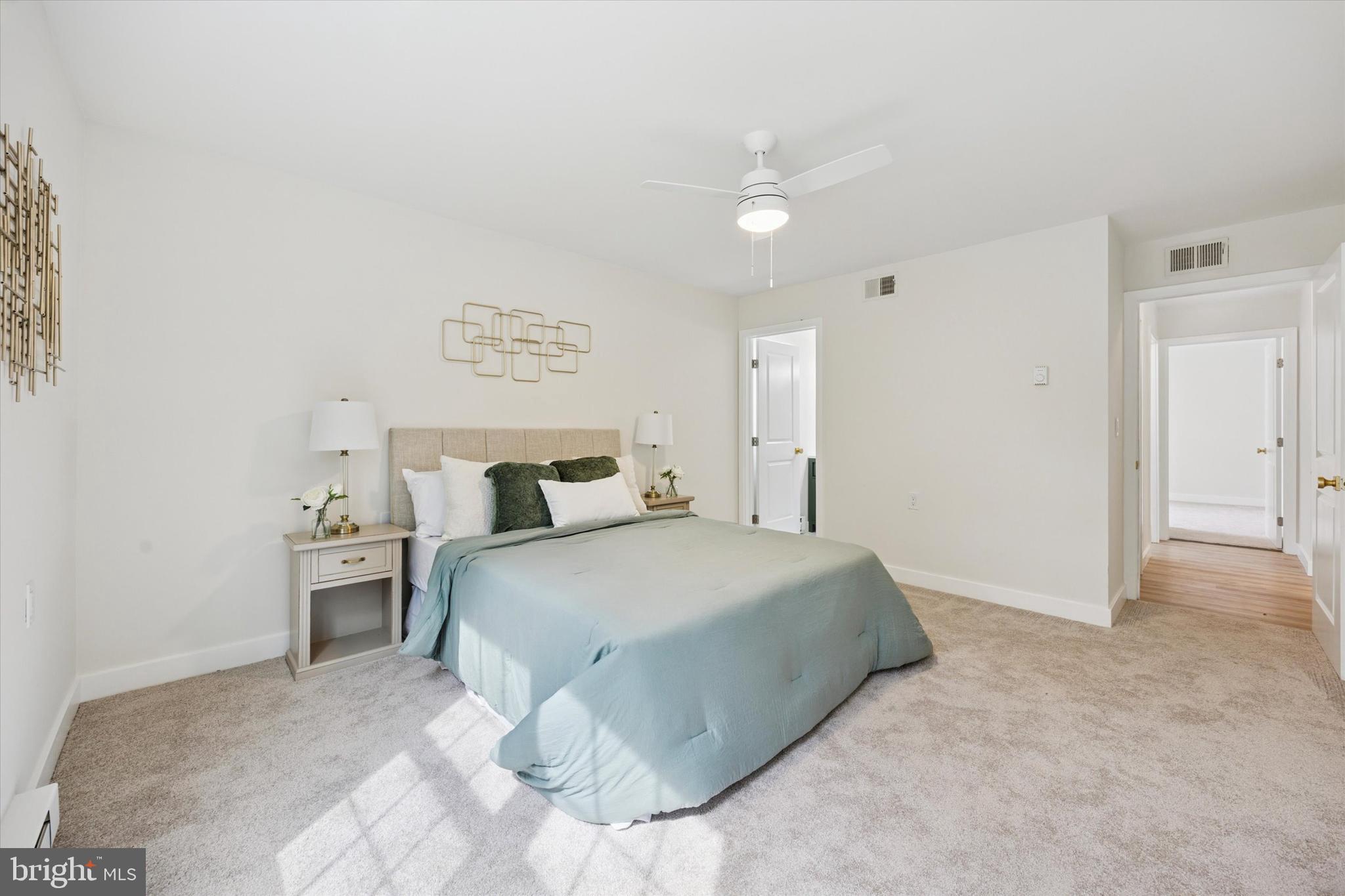 114 Gramercy Place Southampton, NJ 08088 - Photo 19 of 23 a bedroom with a bed and ceiling fan
