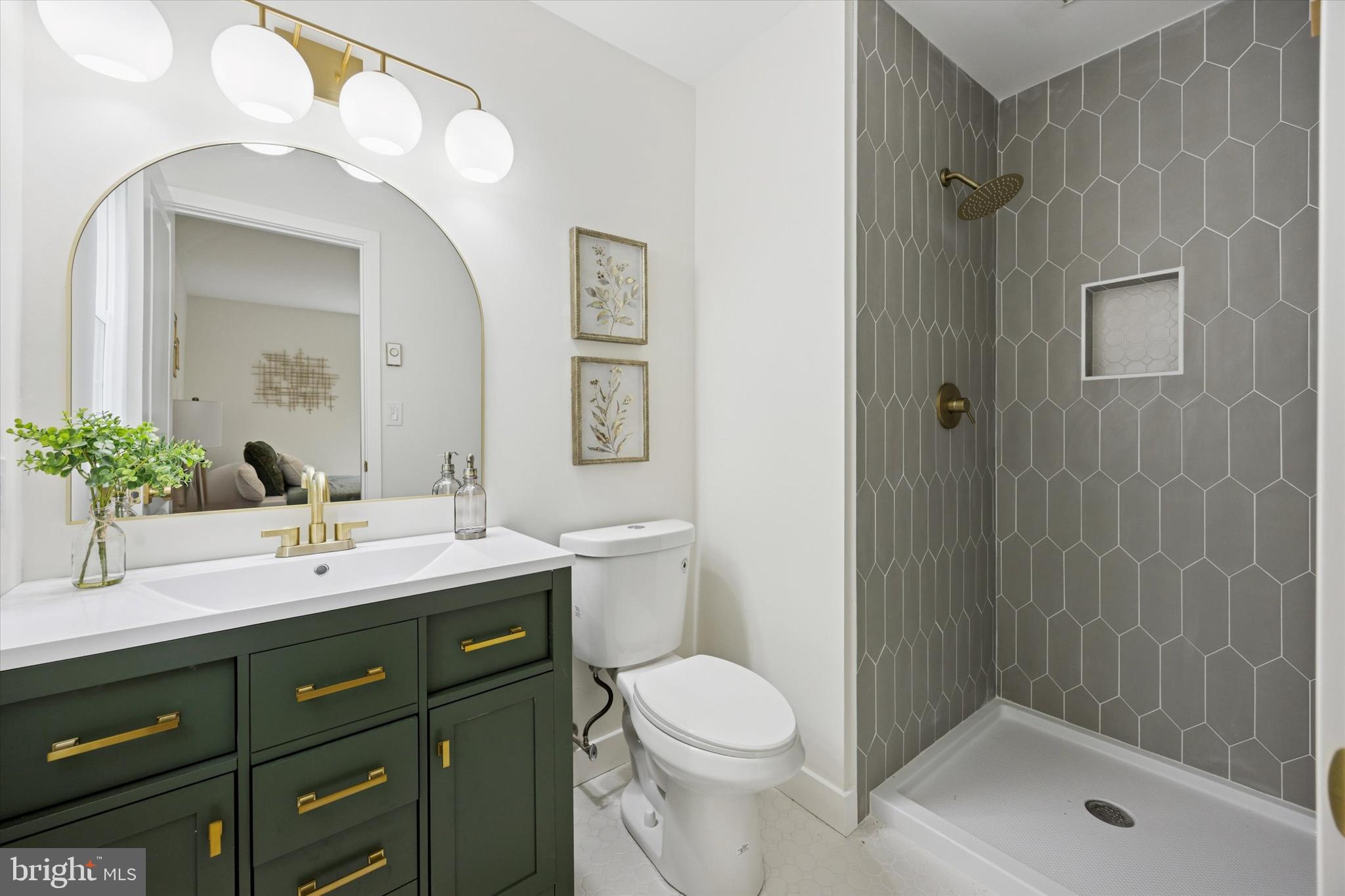 114 Gramercy Place Southampton, NJ 08088 - Photo 20 of 23 a bathroom with a sink a toilet and shower