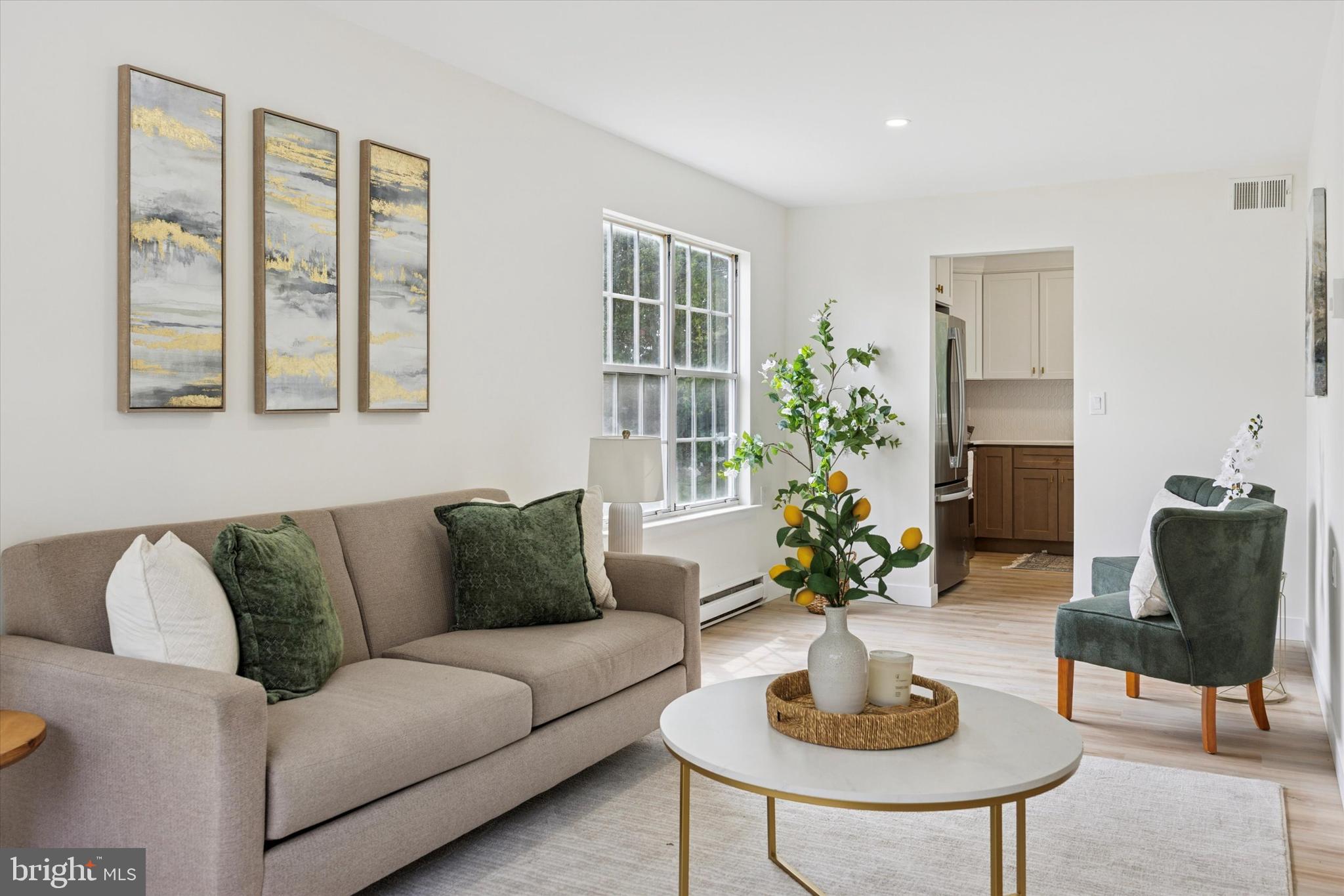 114 Gramercy Place Southampton, NJ 08088 - Photo 6 of 23 a living room with furniture potted plant and window