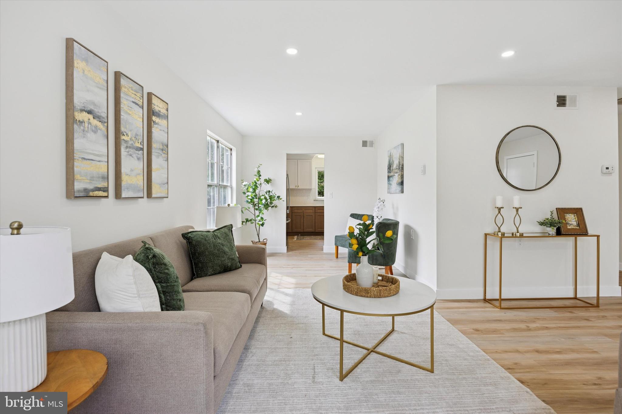 114 Gramercy Place Southampton, NJ 08088 - Photo 7 of 23 a living room with furniture and white walls