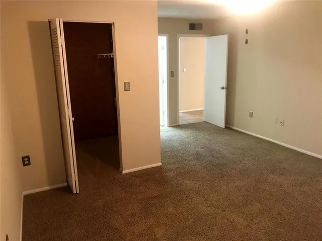 a kitchen with a refrigerator sink and microwave