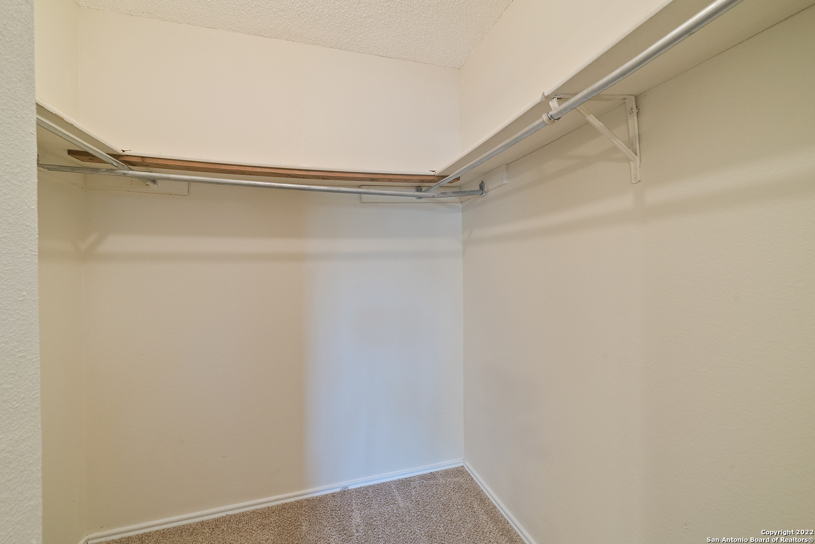 6122 Ridge Oak San Antonio, TX 78250 - Photo 20 of 31 a view of an empty walk in closet