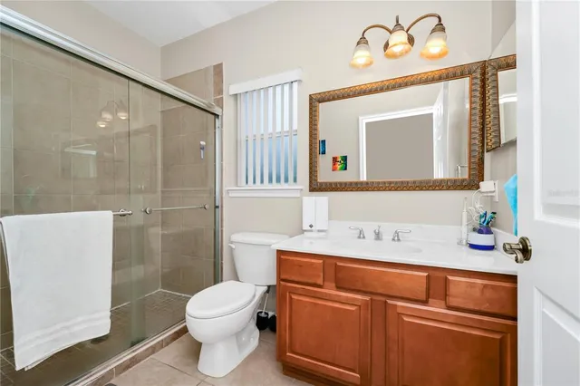 a view of yard with patio