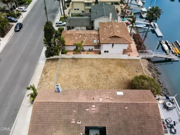 an aerial view of a house with swimming pool
