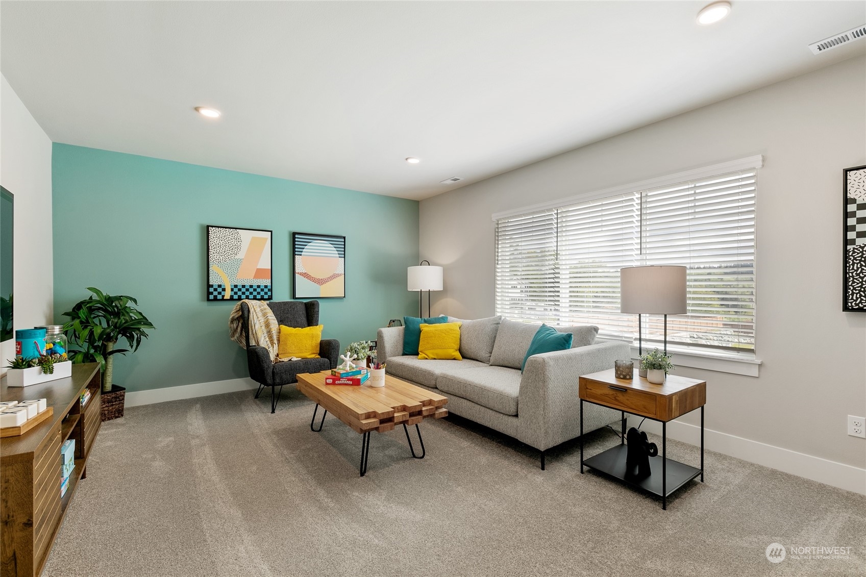22902 22nd Avenue West, Unit EP 23 Bothell, WA 98021 - Photo 32 of 35 a living room with furniture and a window