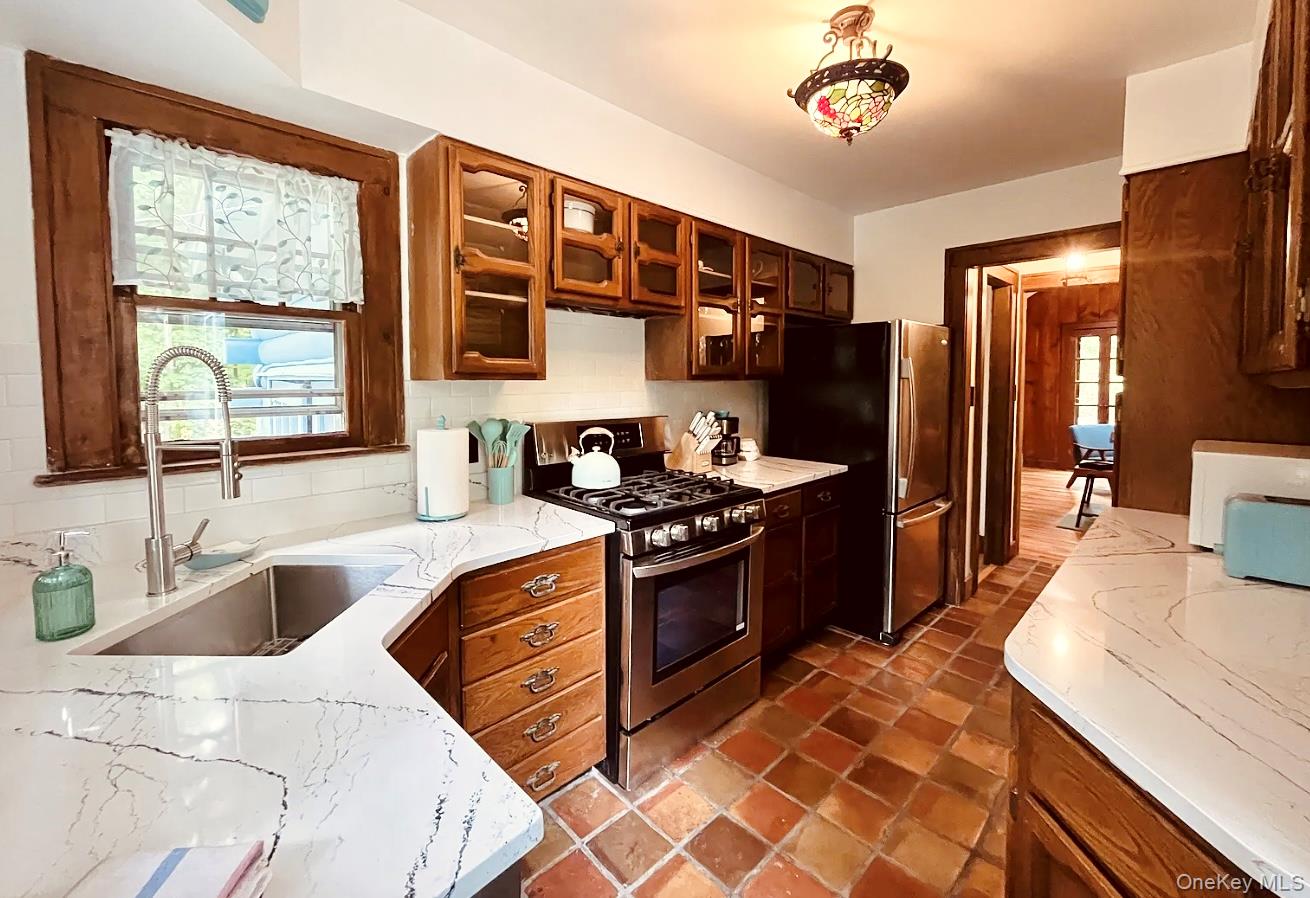 15 Locust Drive Cold Spring, NY 10516 - Photo 2 of 15 a kitchen with stainless steel appliances granite countertop a sink stove and refrigerator