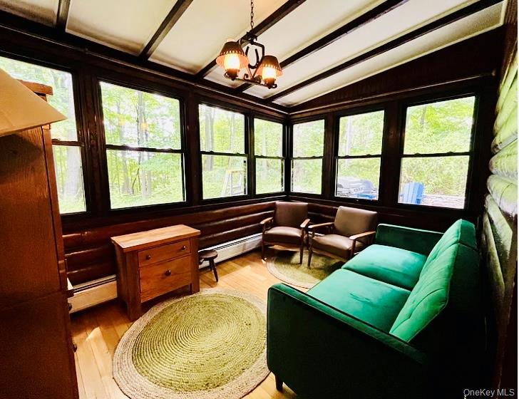 15 Locust Drive Cold Spring, NY 10516 - Photo 8 of 15 a living room with furniture and a floor to ceiling window