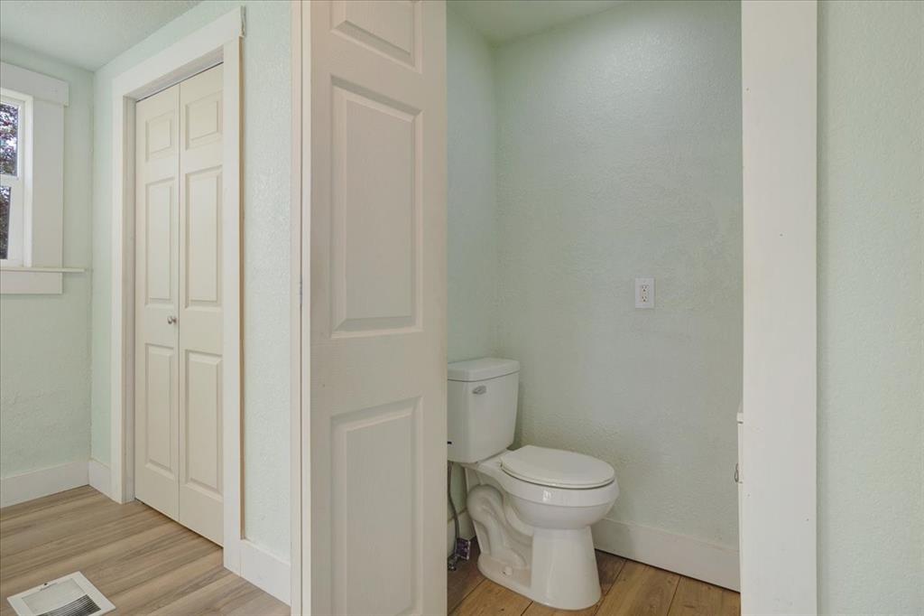 40 Sheryl Lane Denison, TX 75021 - Photo 25 of 40 a bathroom with a toilet and a shower