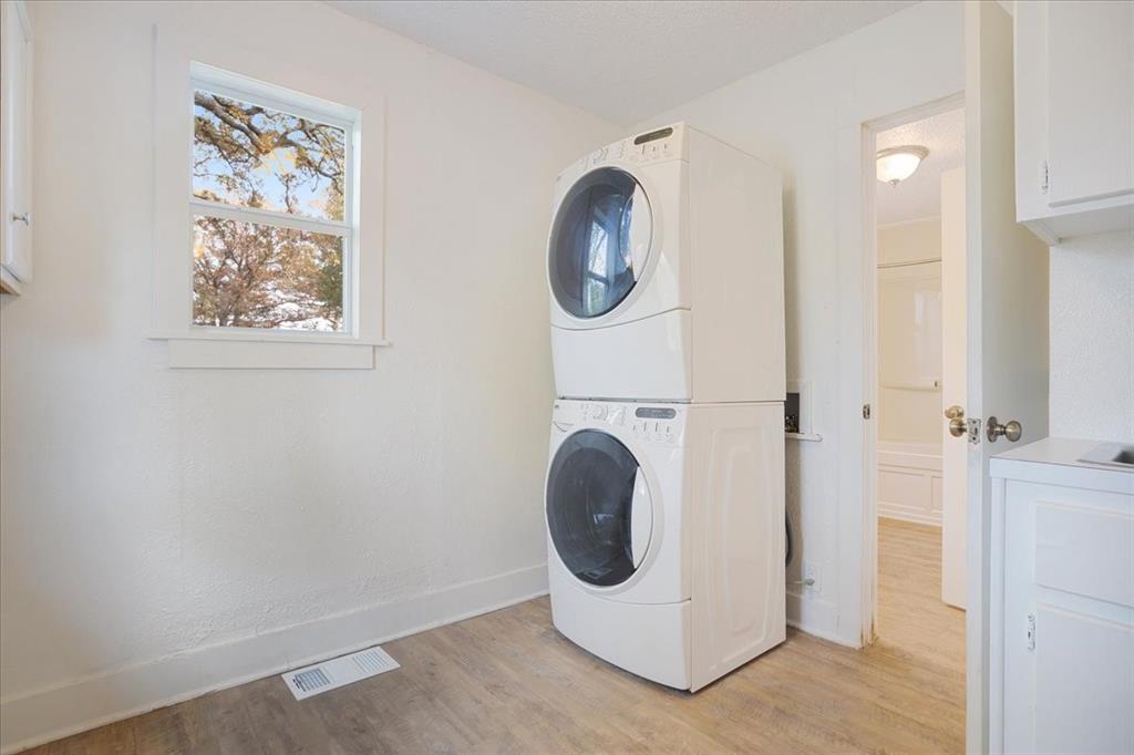 40 Sheryl Lane Denison, TX 75021 - Photo 29 of 40 a utility room with dryer and washer