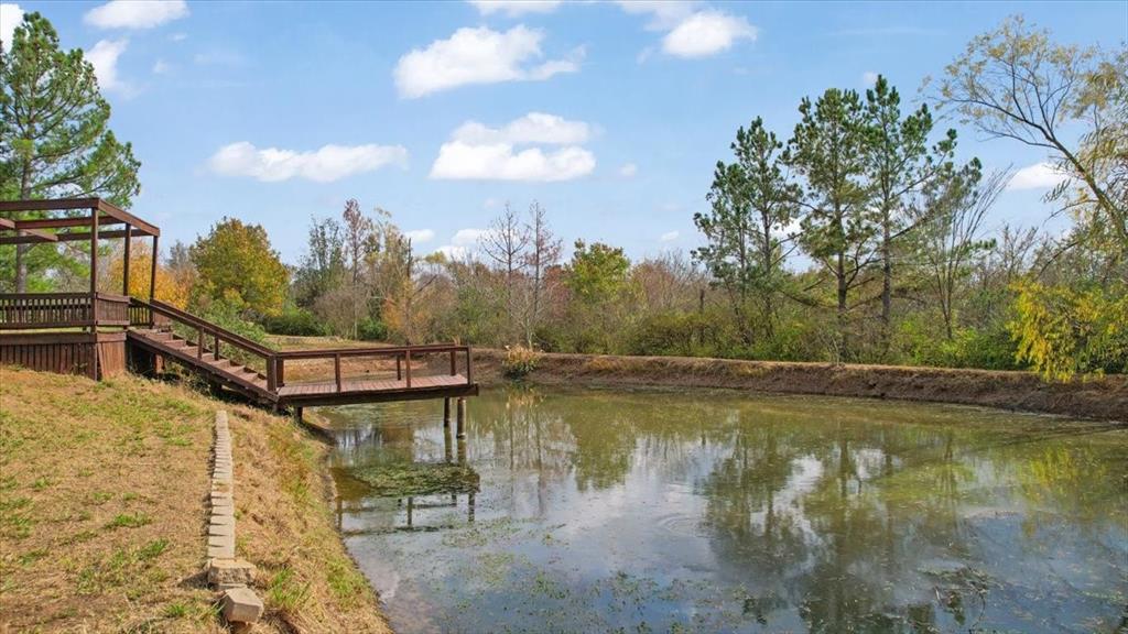 40 Sheryl Lane Denison, TX 75021 - Photo 36 of 40 a view of a lake with a building in the background