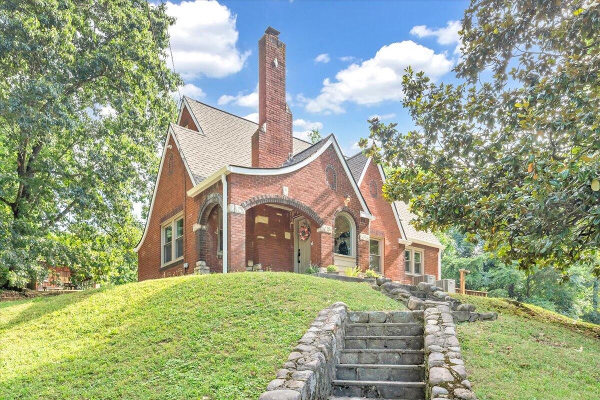 3007 Green Ridge Road Roanoke, VA 24019 - Photo 1 of 56 a view of a house with a yard