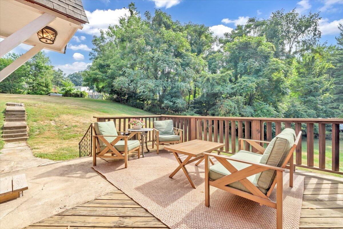 3007 Green Ridge Road Roanoke, VA 24019 - Photo 36 of 56 a patio with water view and a backyard