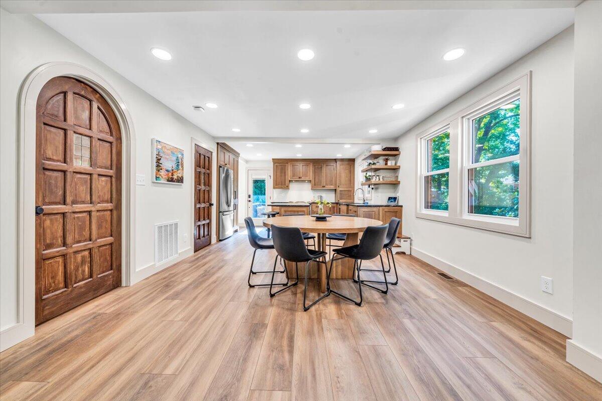 3007 Green Ridge Road Roanoke, VA 24019 - Photo 6 of 56 a view of a dining room with furniture window and wooden floor