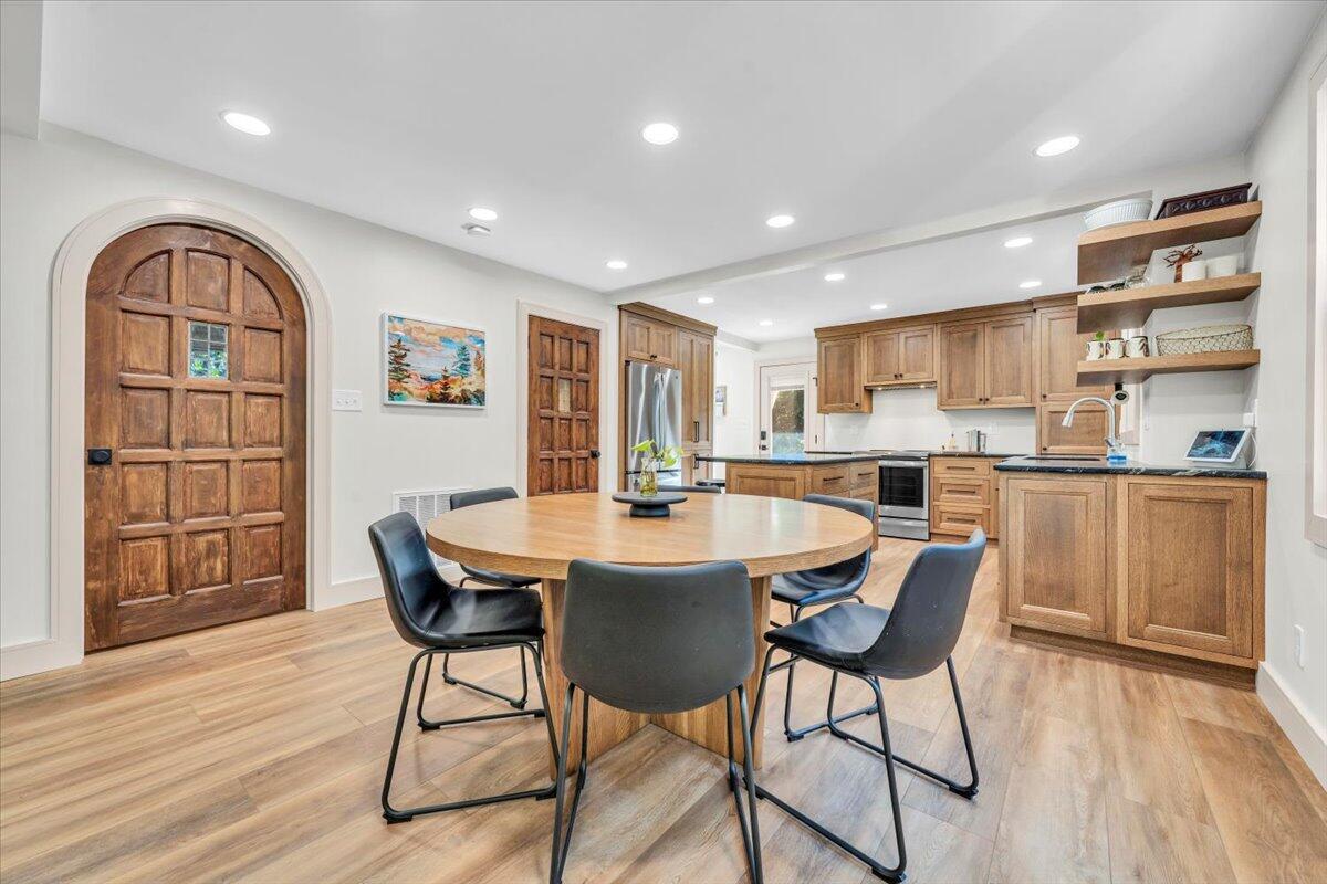 3007 Green Ridge Road Roanoke, VA 24019 - Photo 7 of 56 a view of a dining room with furniture and wooden floor