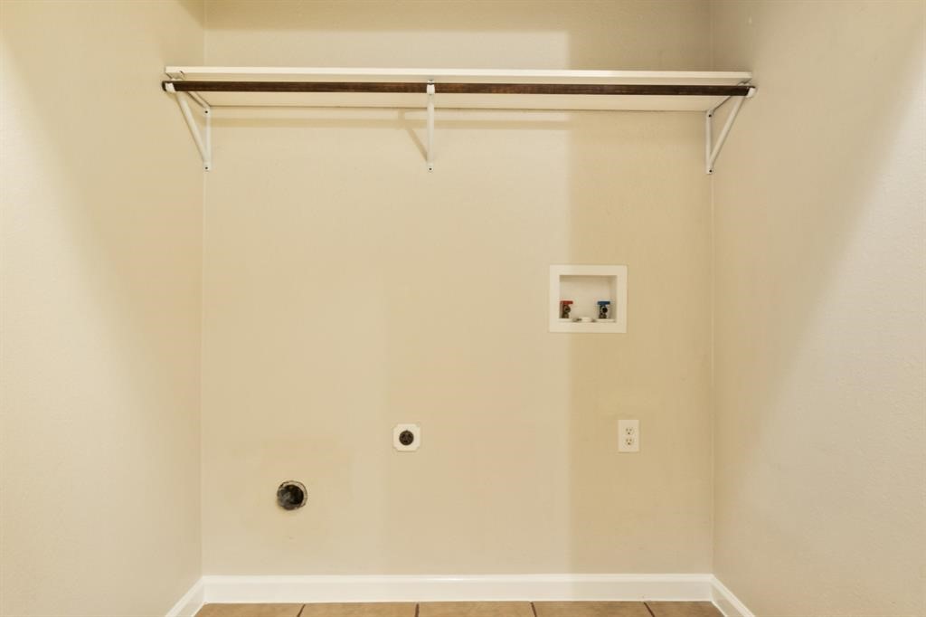 6500 South Fm 565 Rd Cove Cove, TX 77523 - Photo 7 of 8 a bathroom with a shower