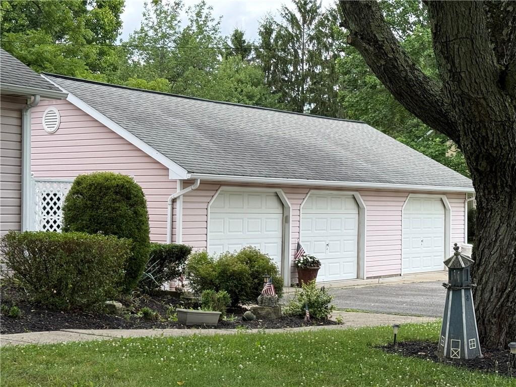 Large 3 stall garage.