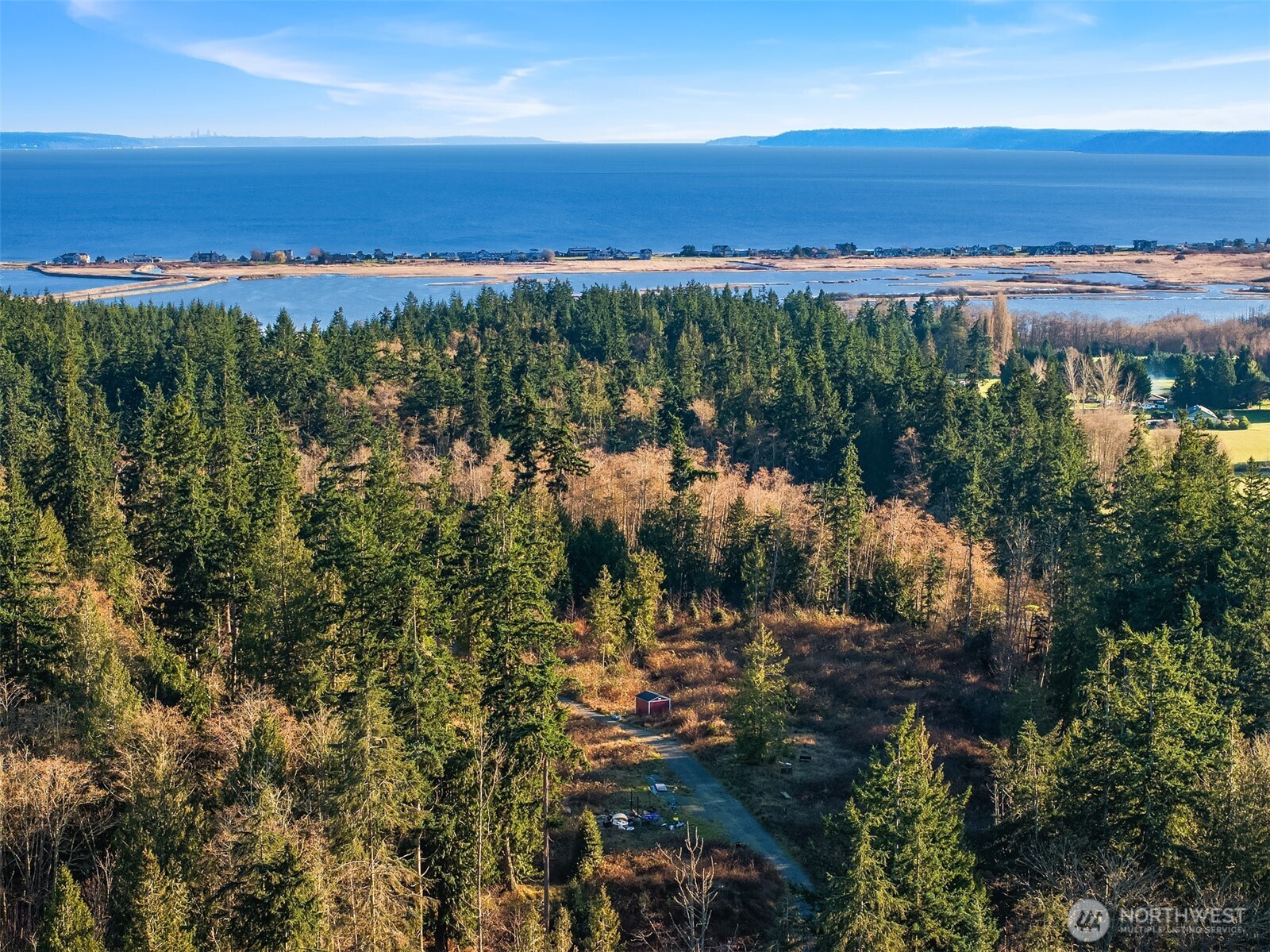 2150 Newman Road Langley, WA 98260 - Photo 2 of 12 a view of a city with lots of trees