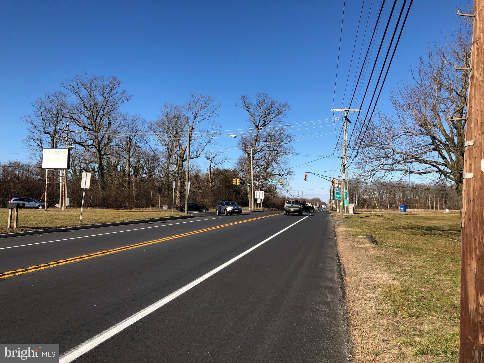 1444 Harding Highway Newfield, NJ 08344 - Photo 2 of 6 a view of a city street both side of a building