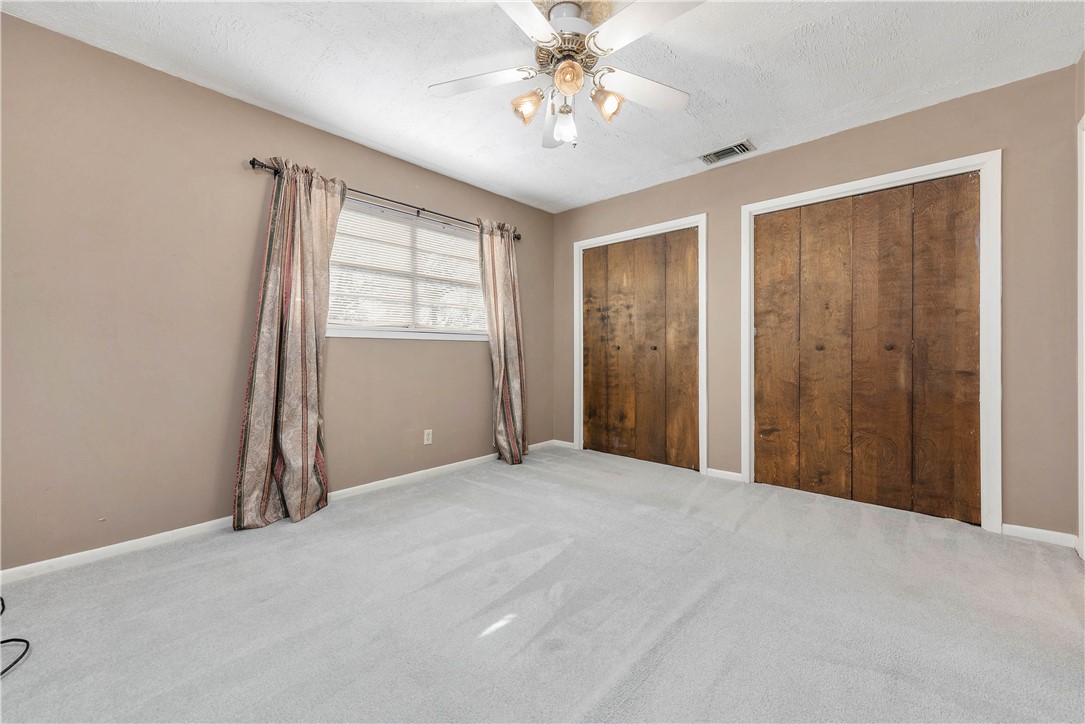 12994 Hunters Creek Road College Station, TX 77845 - Photo 25 of 35 a view of an empty room with a window