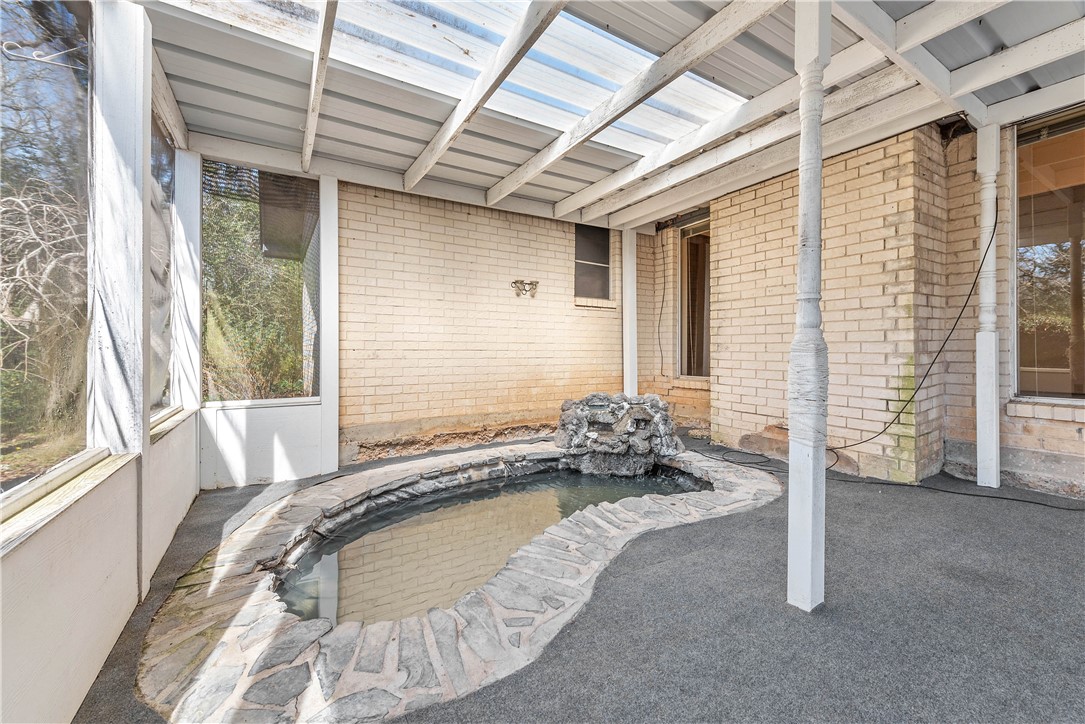 12994 Hunters Creek Road College Station, TX 77845 - Photo 30 of 35 a bed sitting in front of a window