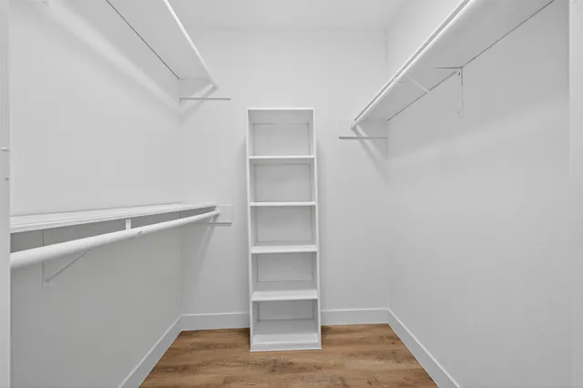 a view of an empty walk in closet