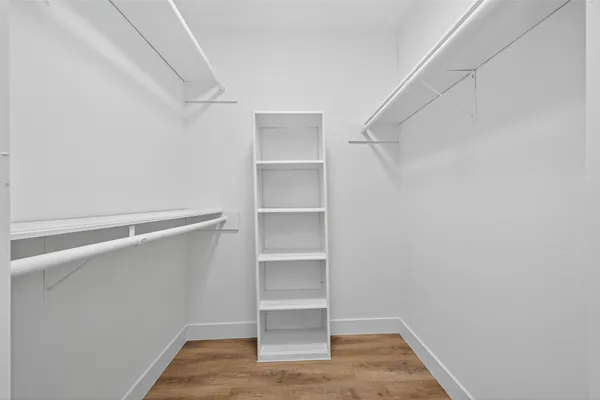 a view of an empty walk in closet