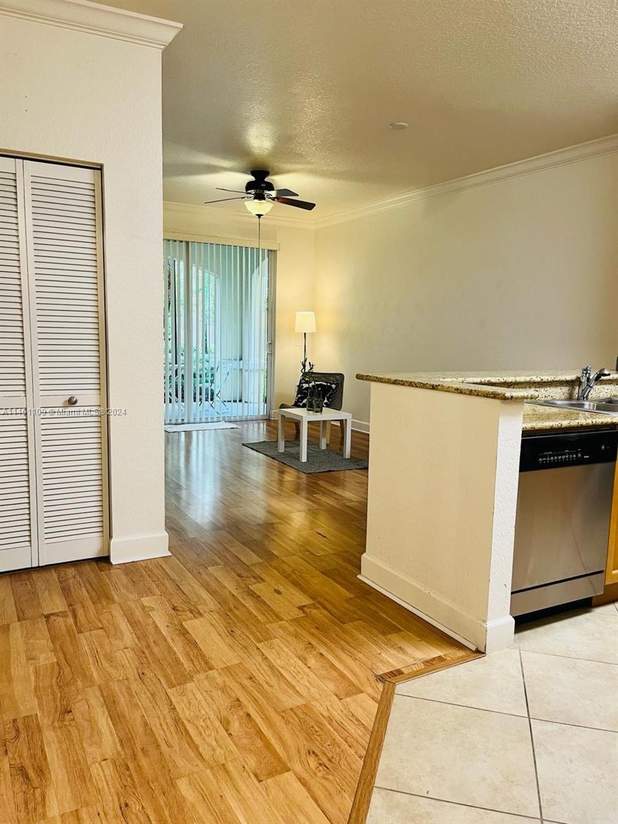 1121 Renaissance Way, Unit 1121 Boynton Beach, FL 33426 - Photo 6 of 29 a view of a room with wooden floor