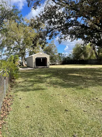 a view of ocean with trees