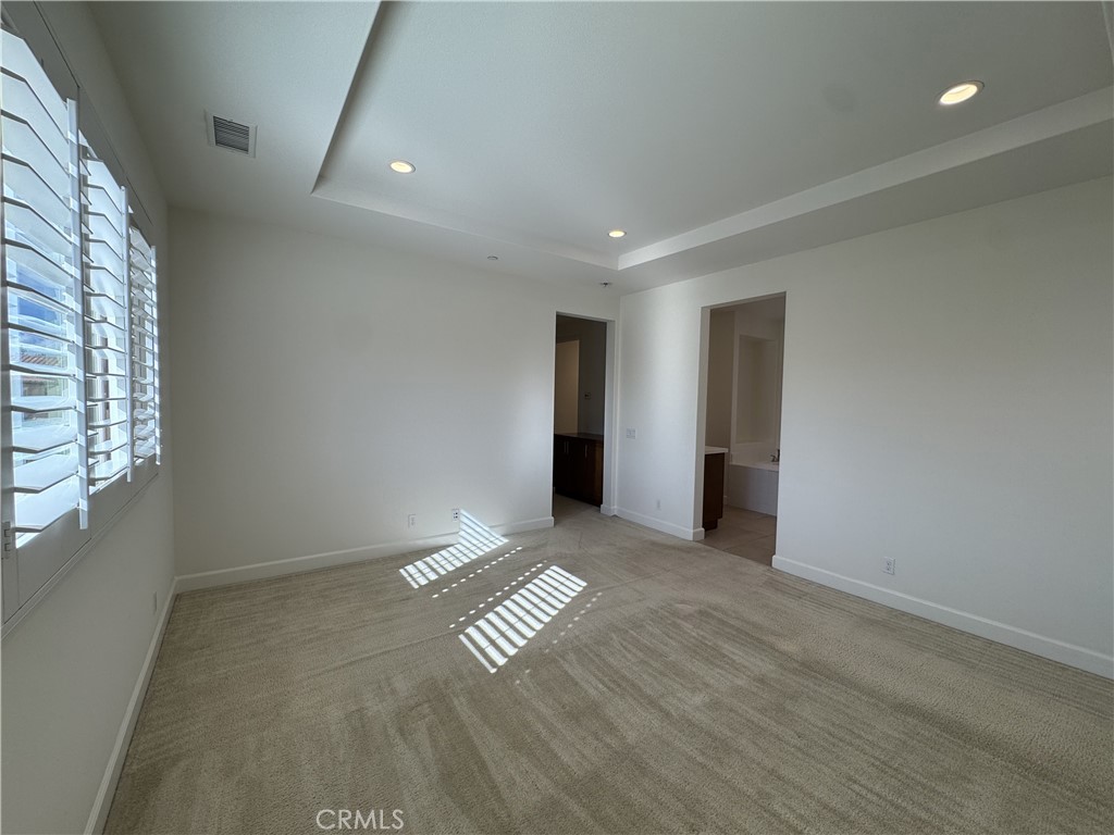66 Diamond Flats Irvine, CA 92602 - Photo 19 of 35 a view of an empty room and window