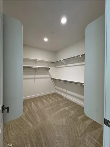 a room with walk in closet