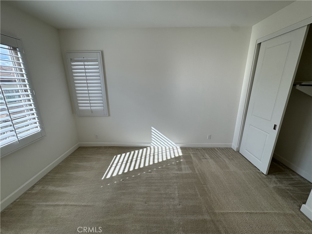 66 Diamond Flats Irvine, CA 92602 - Photo 28 of 35 an empty room with windows