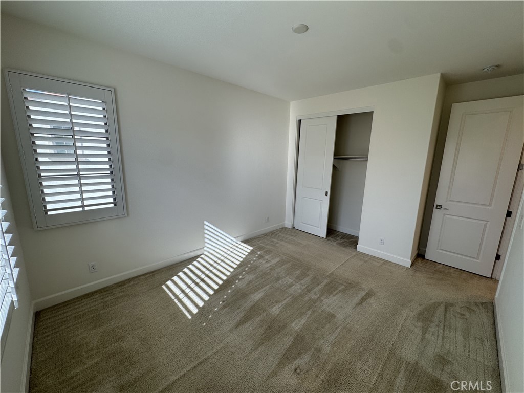 66 Diamond Flats Irvine, CA 92602 - Photo 29 of 35 a view of an empty room with a window