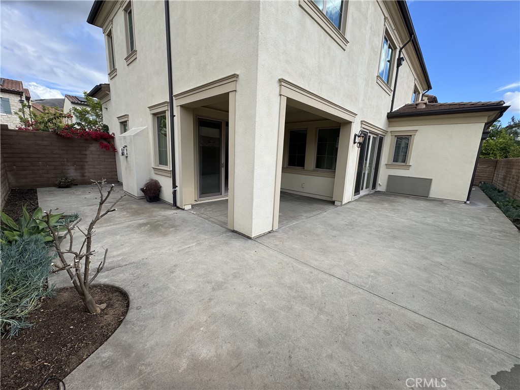 66 Diamond Flats Irvine, CA 92602 - Photo 33 of 35 a view of a house with a yard