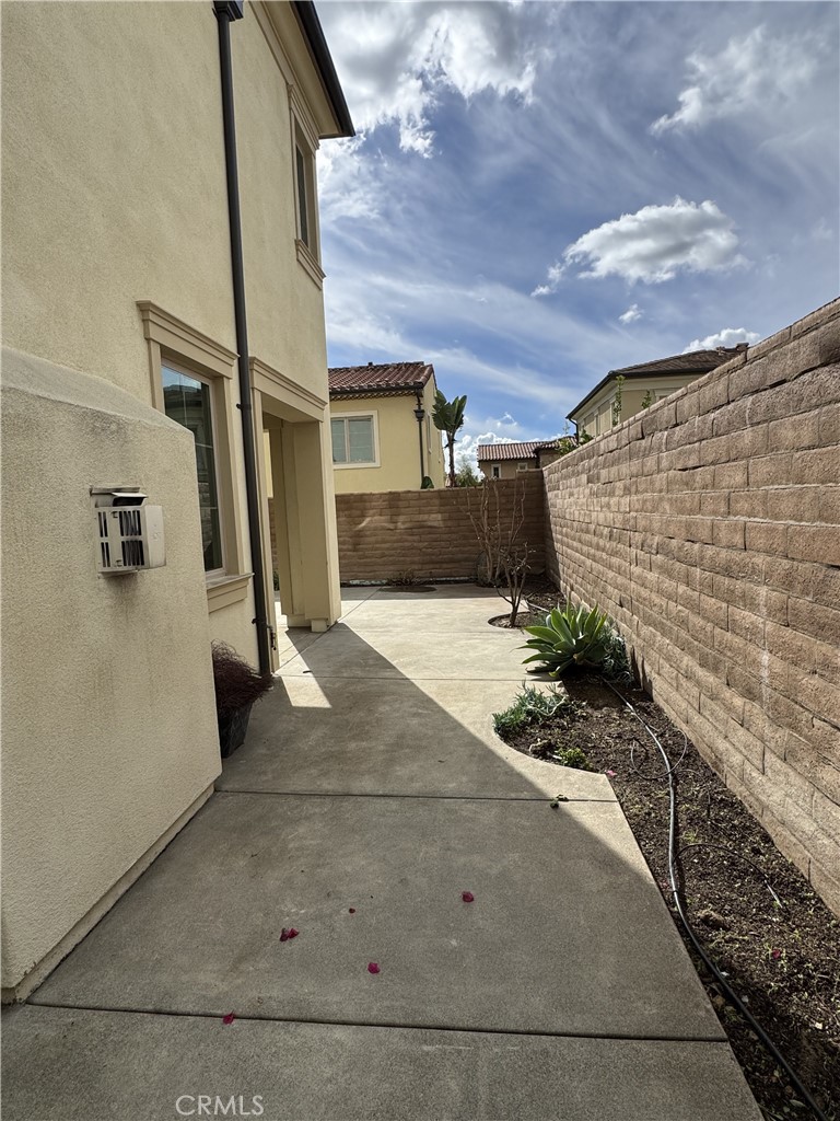 66 Diamond Flats Irvine, CA 92602 - Photo 34 of 35 a view of a pathway along the building