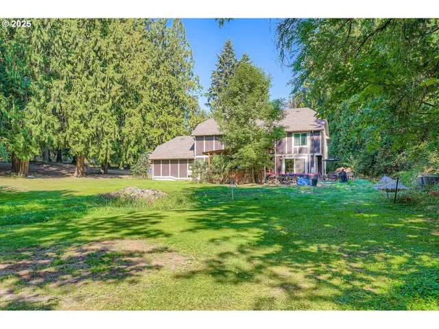 a view of a house with a big yard