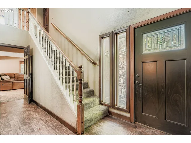 a view interior of a house with wooden floor and windows