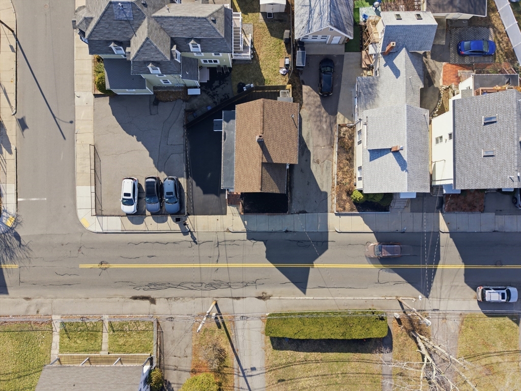 7 Pine Street Stoneham, MA 02180 - Photo 19 of 23 an aerial view of residential houses with outdoor space